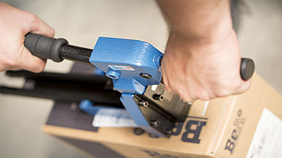 Staplers for closing cardboard boxes