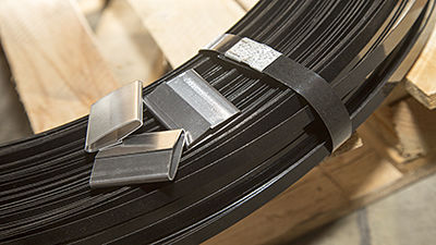 Steel seal for strapping